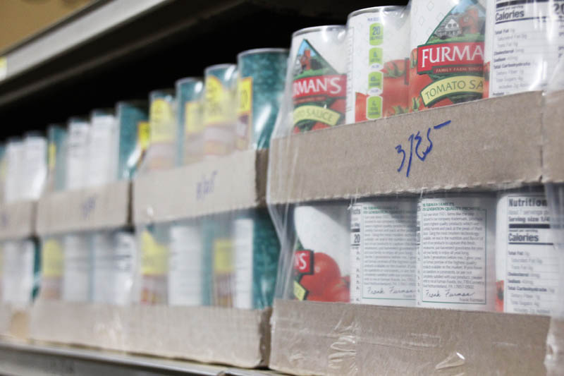 Open-Door-Food-Pantry cans of tomatoes